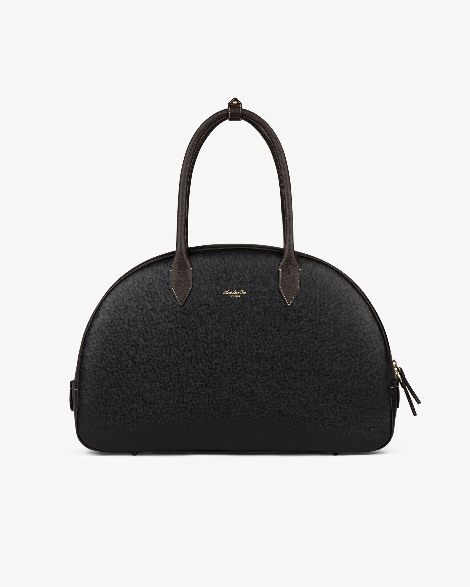 Full Grain Leather Crescent Shoulder Bag in black with curved top, structured shape, two handles, and gold center logo.