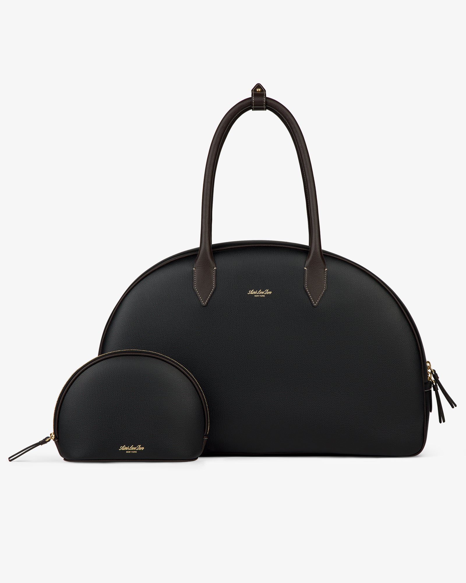 Two Full Grain Leather Crescent Shoulder Bags, one large and one small, black with gold zippers on a white background.