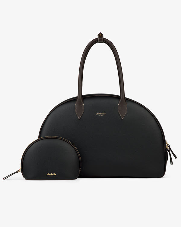 Two Full Grain Leather Crescent Shoulder Bags, one large and one small, black with gold zippers on a white background.