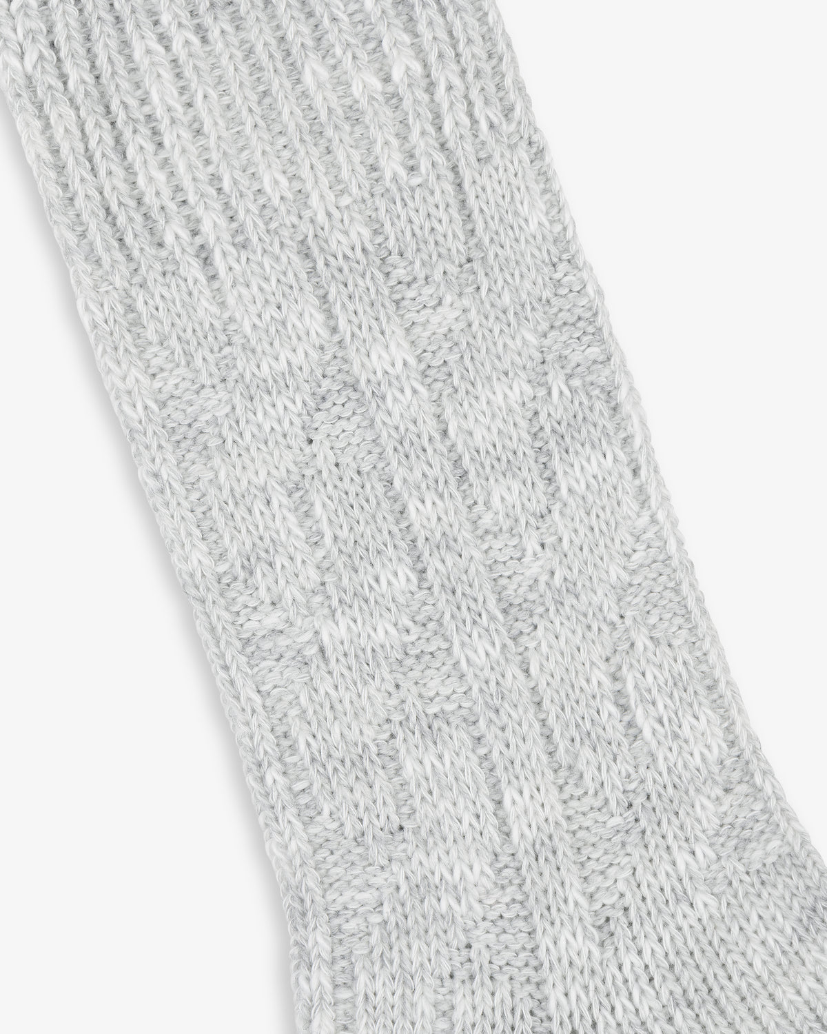 Close-up of a textured light grey Cable Knit Hiking Sock with a ribbed and patterned design.