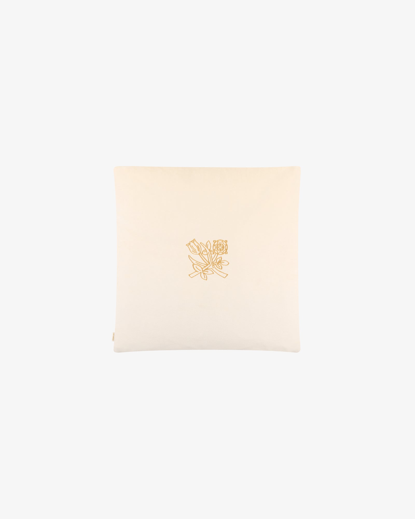 The Queens Crest Throw Pillow is cream-colored with a yellow embroidered floral line drawing in the center.