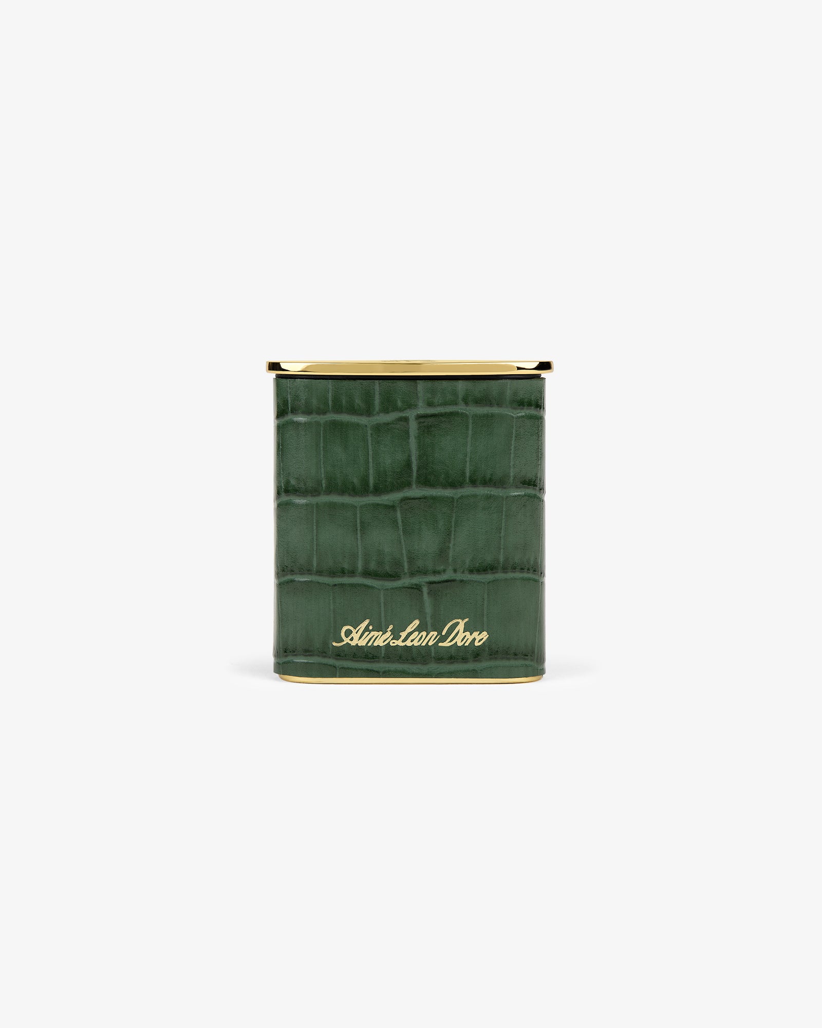 A green faux-crocodile Queens Crest Croc Portable Ashtray with gold trim and Aimé Leon Dore script on the front.