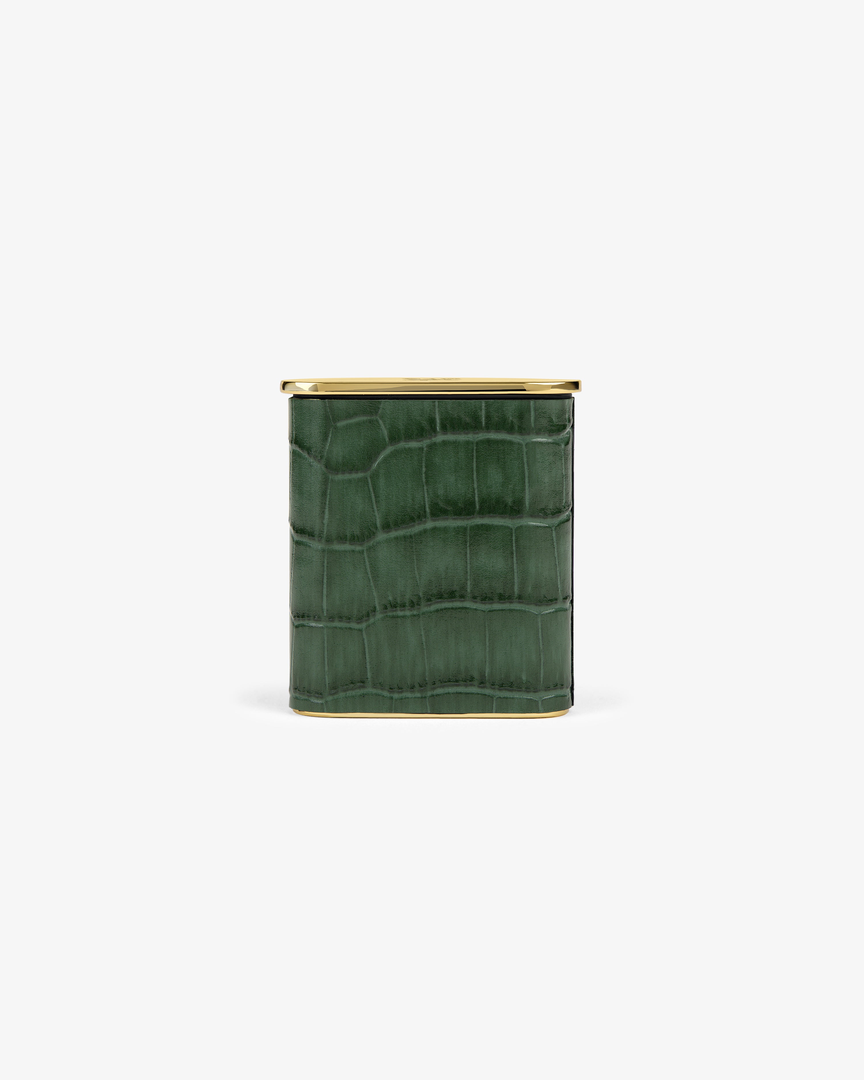 The Queens Crest Croc Portable Ashtray is a square green container with a crocodile texture and gold lid on white background.