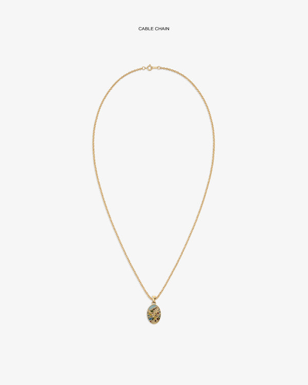 14Kt Gold Molina Pendant: gold cable chain necklace with round pendant and blue-gold tree design.