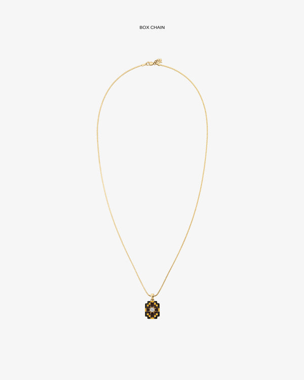Diamond Mosaic Pendant: Gold box chain necklace with a small square pendant featuring a black and gold geometric design.
