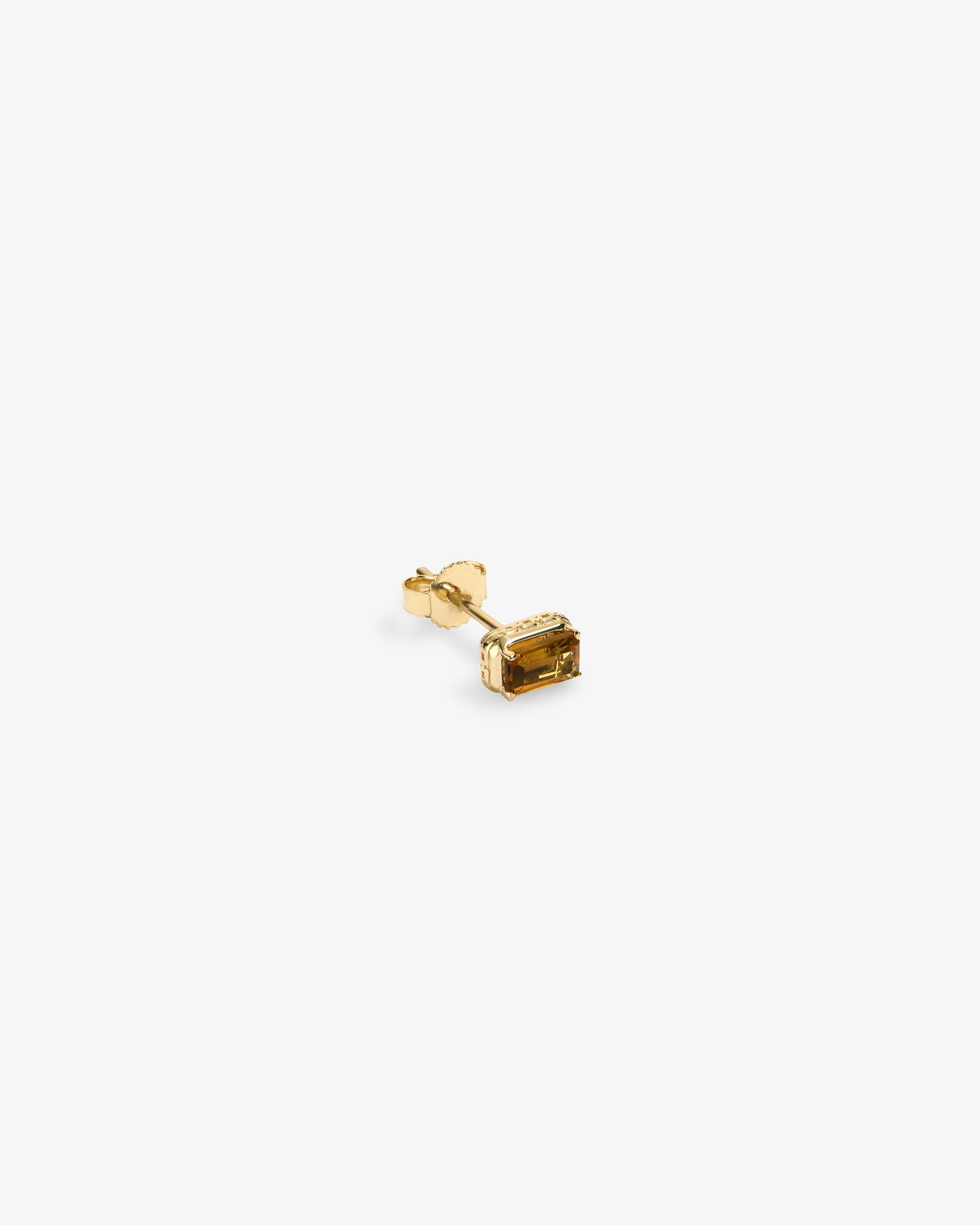 14Kt Gold Citrine Earring: single gold stud with a rectangular baguette-cut yellow gemstone on a white background.