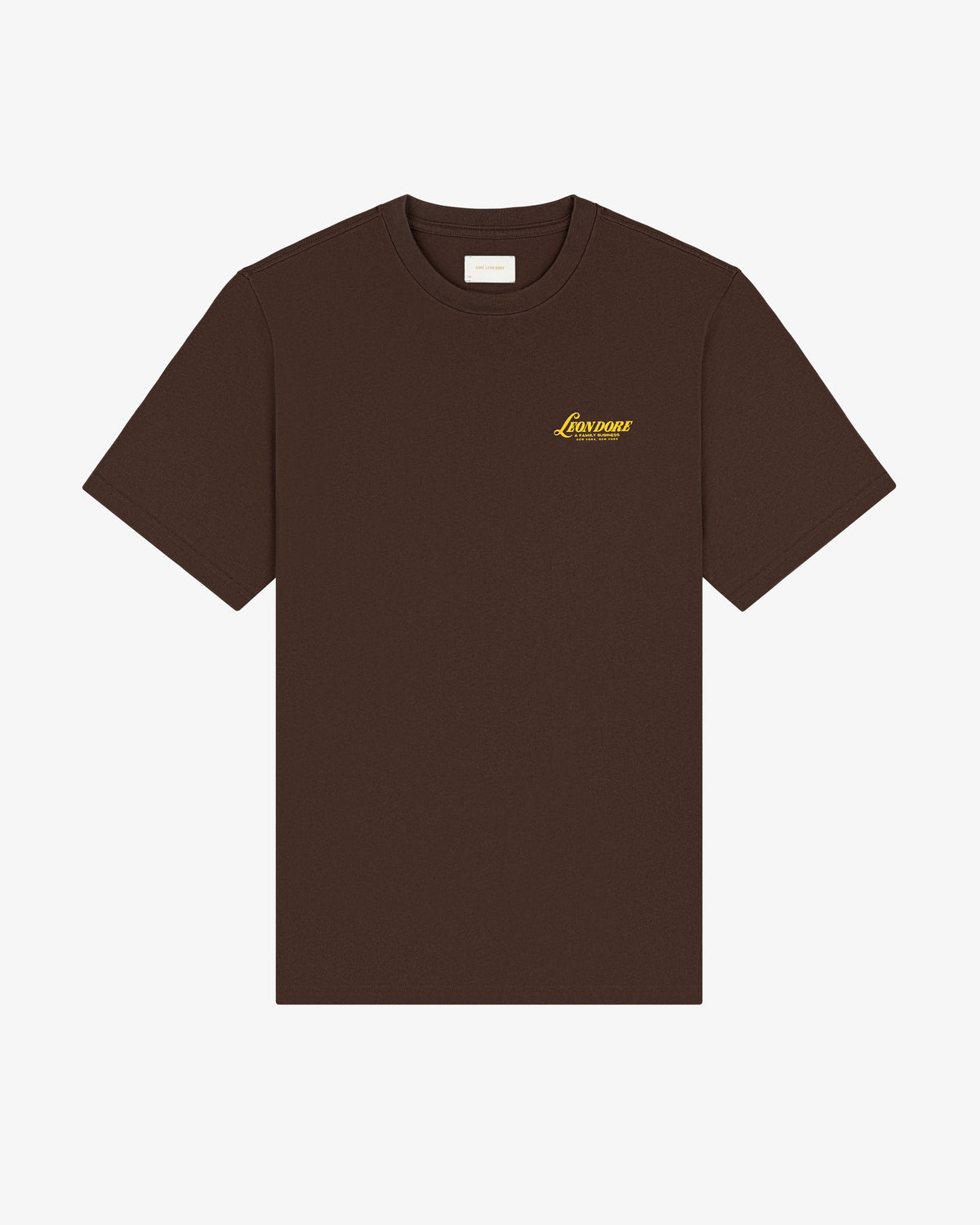 Brown Leon Dore Tee with short sleeves and small yellow Lowtone logo on left chest, shown on white background.