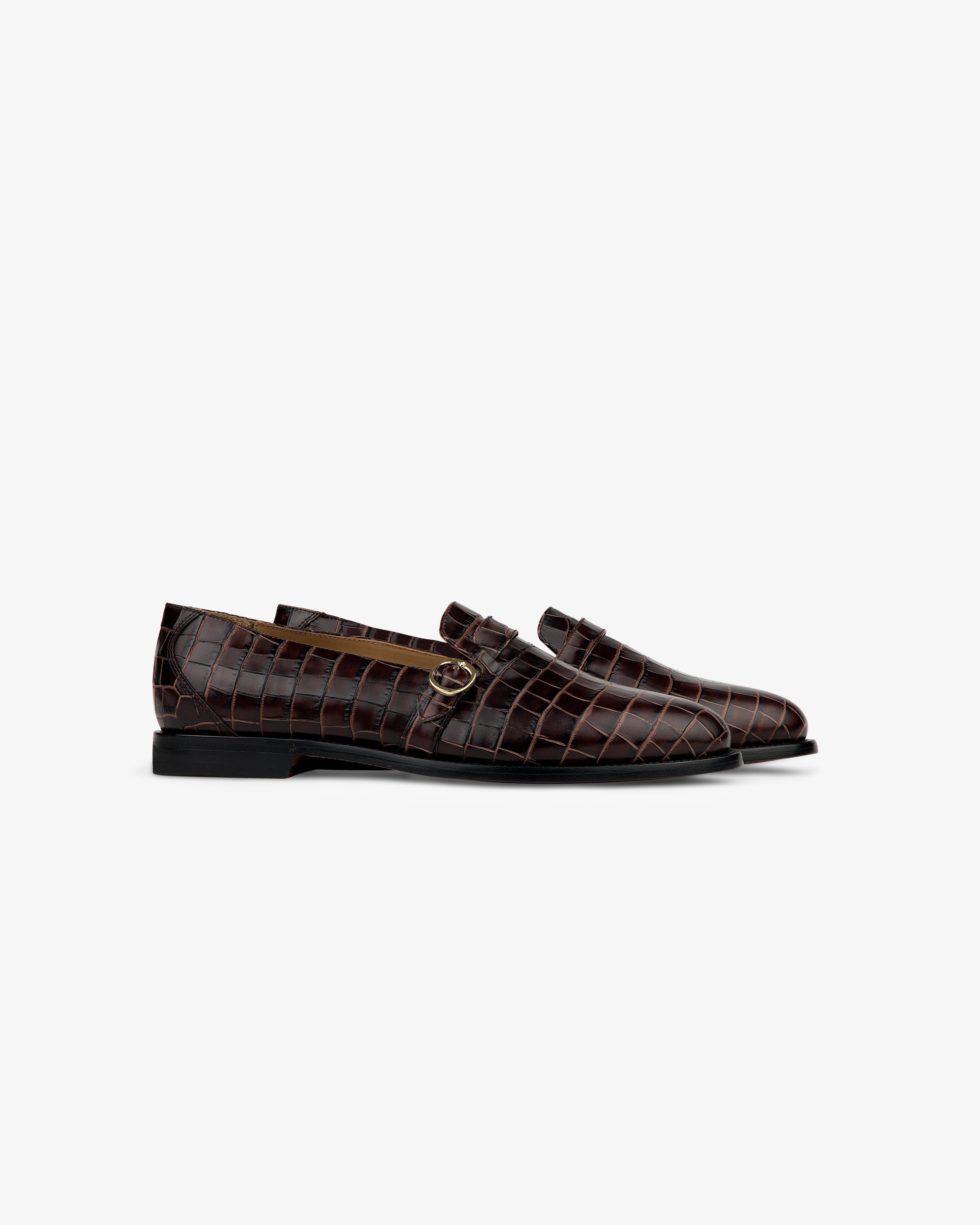 Venetian Croc Buckle Loafers, brown with gold buckle, crocodile pattern leather, side view on white background.