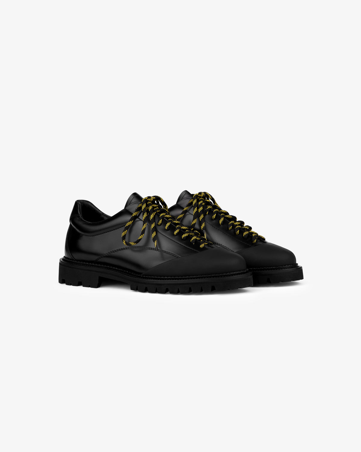 Leather Derby Hiker: black leather lace-up shoes with chunky soles, yellow-black striped laces, on white background.
