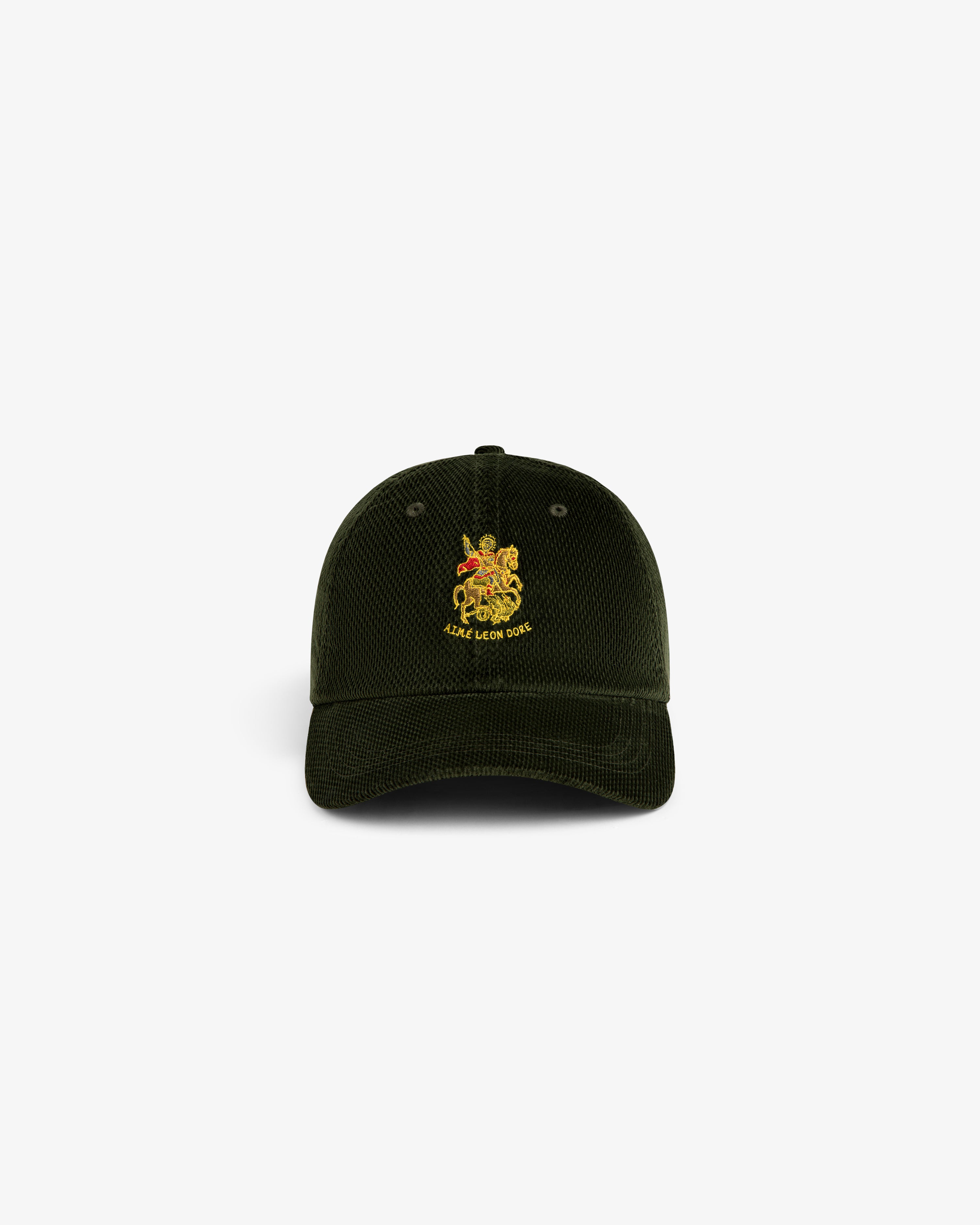 Saint George Corduroy Hat in dark green with yellow crest and “LUXE LION CREW” embroidered on the front.