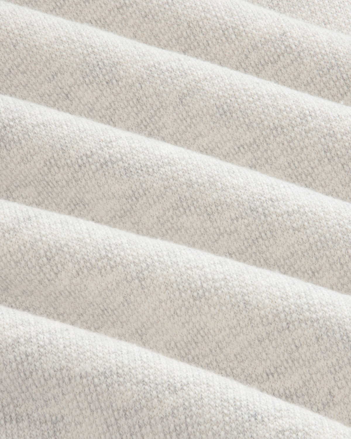 Close-up of Stone Washed Marina Sweatpants fabric showing textured, off-white diagonal ridges in a repeating pattern.