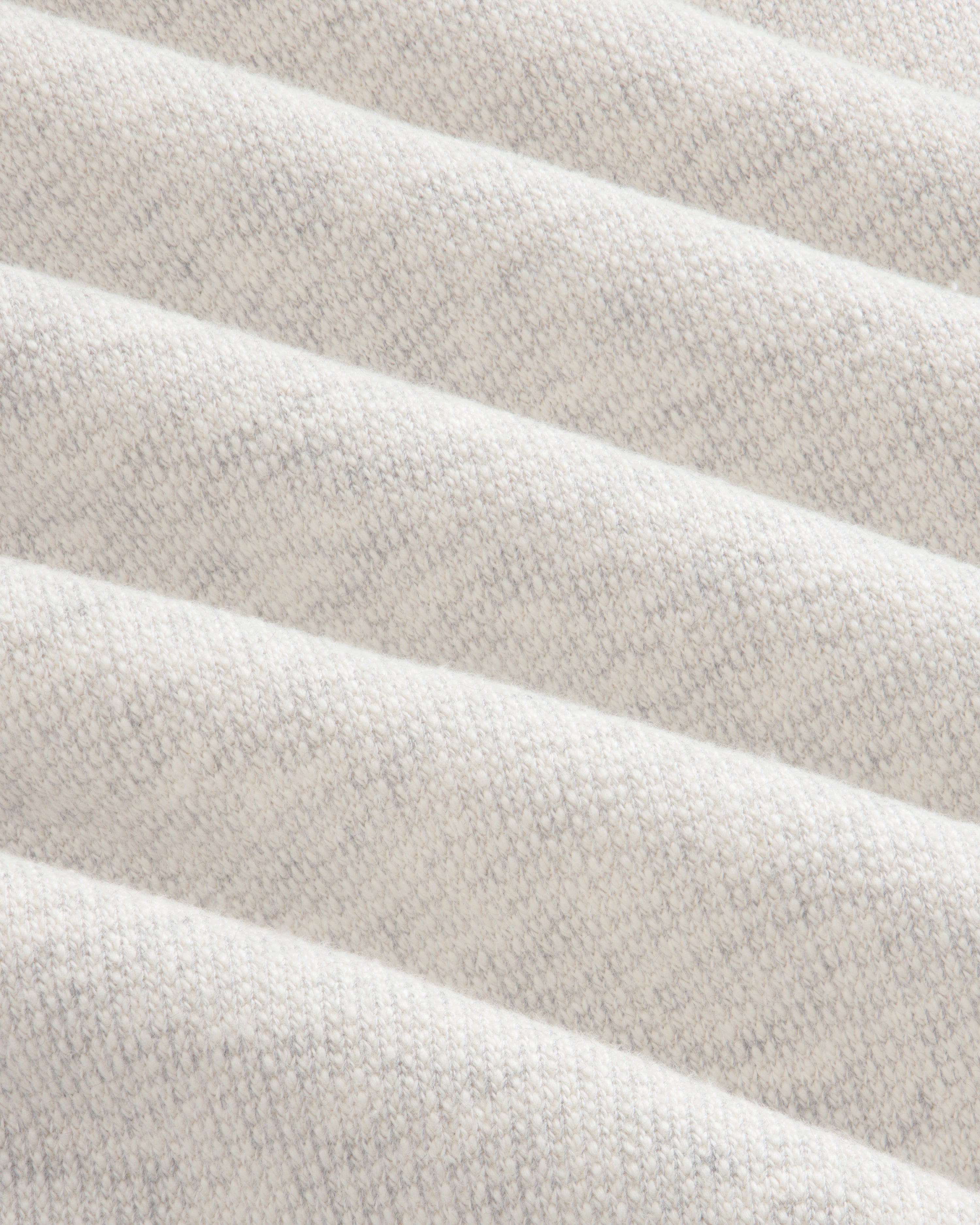 Close-up of Stone Washed Marina Sweatpants fabric showing textured, off-white diagonal ridges in a repeating pattern.