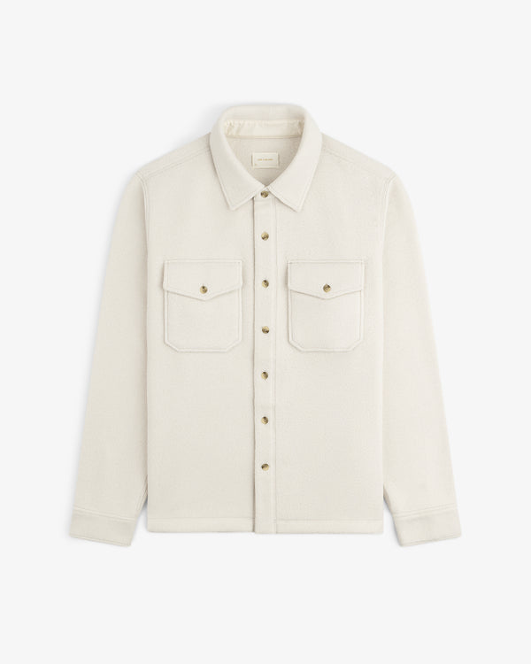Melange Fleece Shirt—cream, long-sleeve, button-up with two chest pockets and collar, laid flat on white.