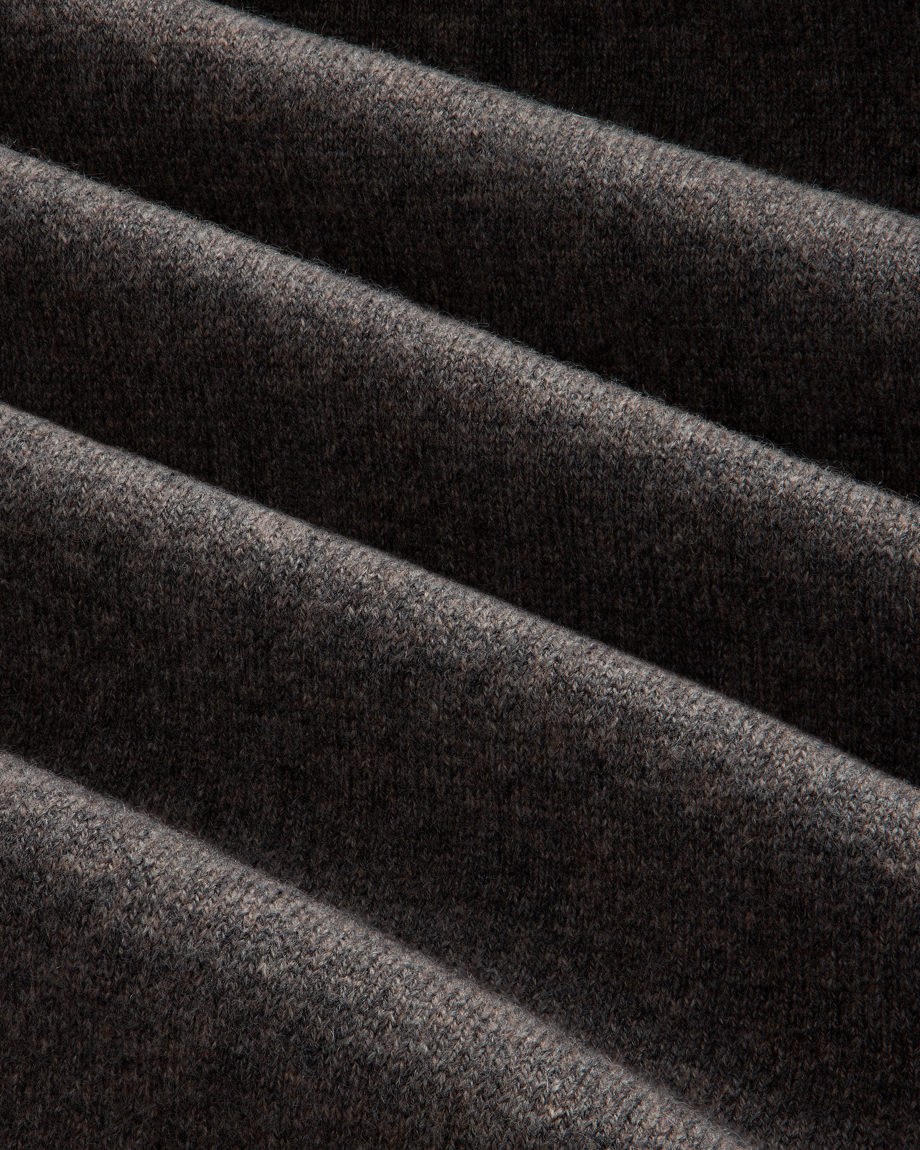 Close-up of the Full-Zip Pavilion Cashmere Hoodie in dark brown, showing its soft texture and even horizontal folds.