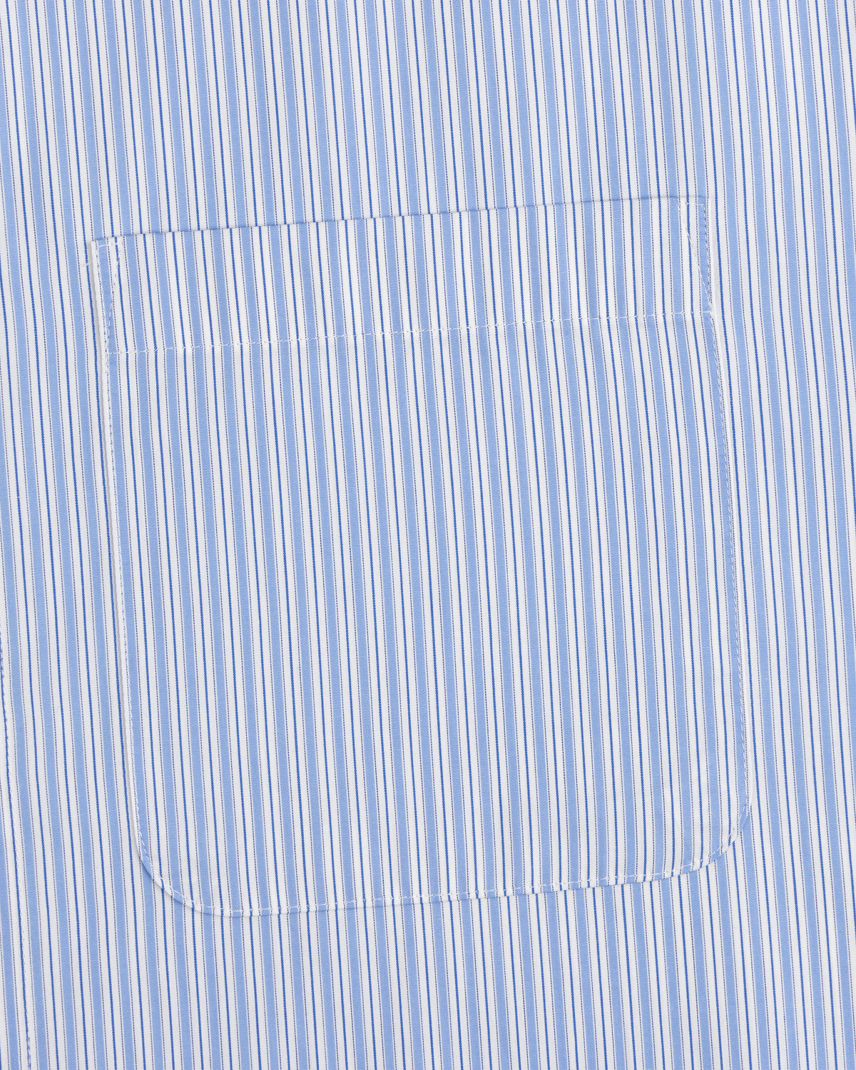 Light blue/white vertical striped pocket on matching Poplin Casual Shirt, neatly sewn for a polished look.