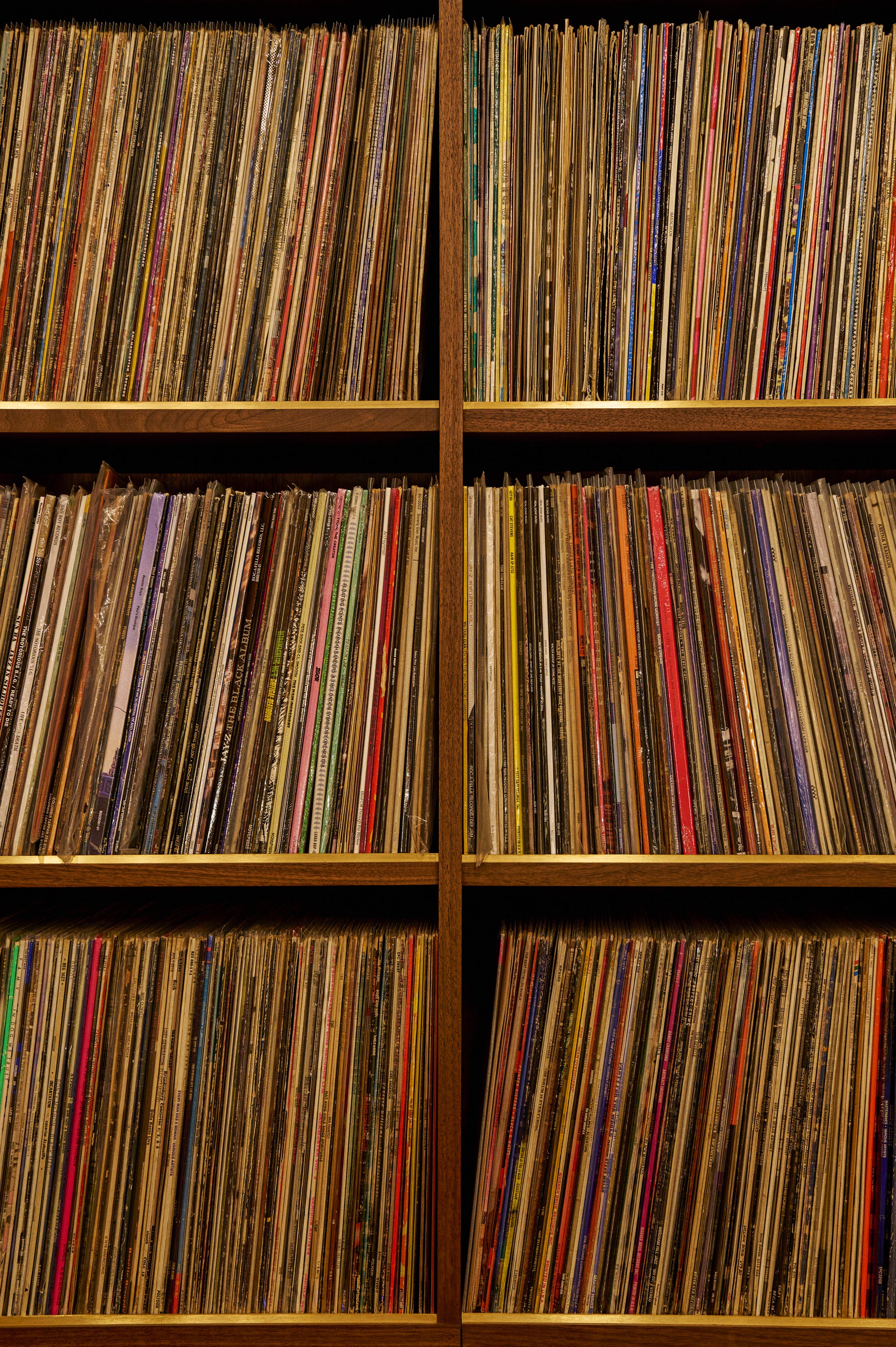 Close up of record wall behind DJ area 