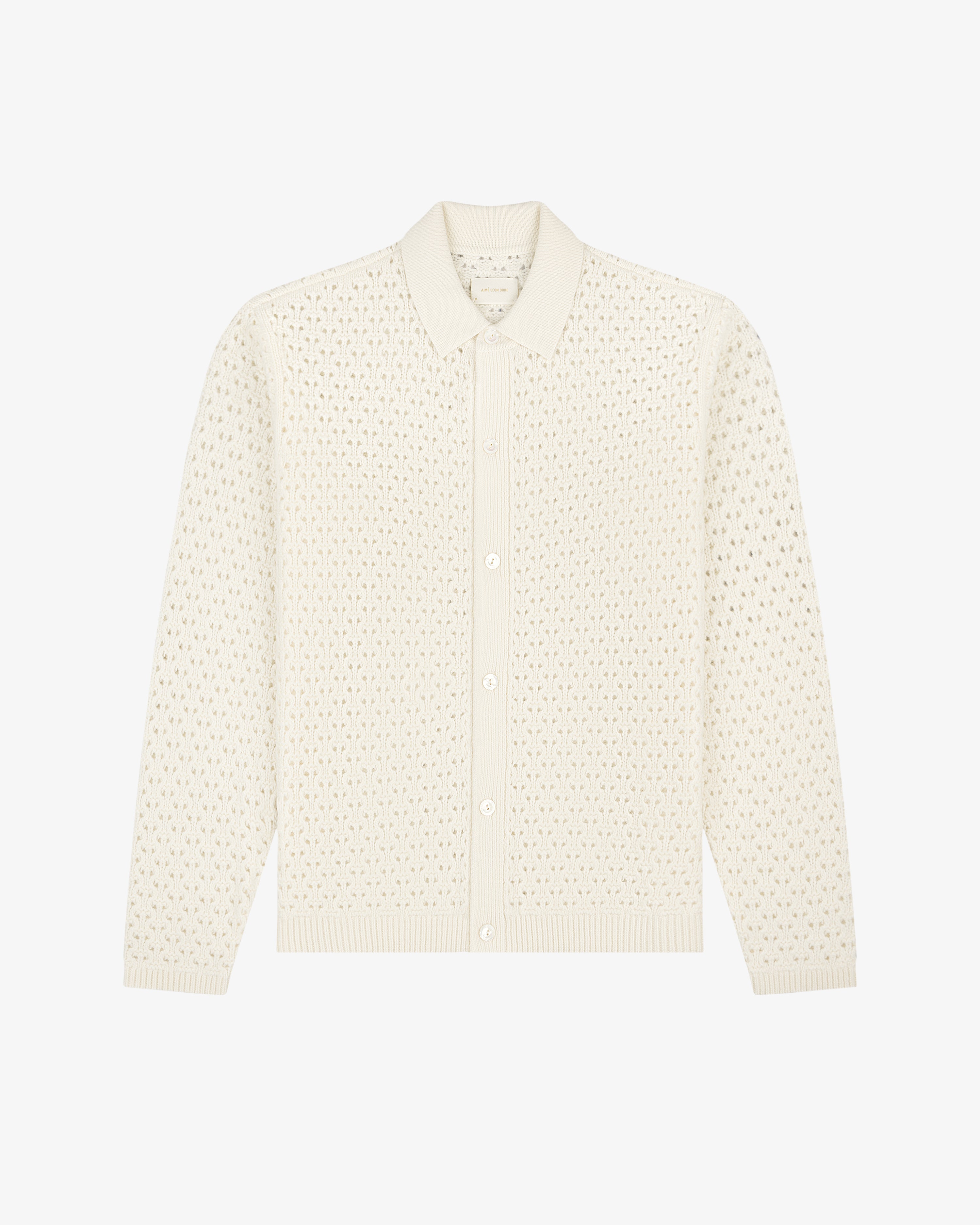 Cream knit polo cardigan with long sleeves and textured pattern, displayed flat on a white background.