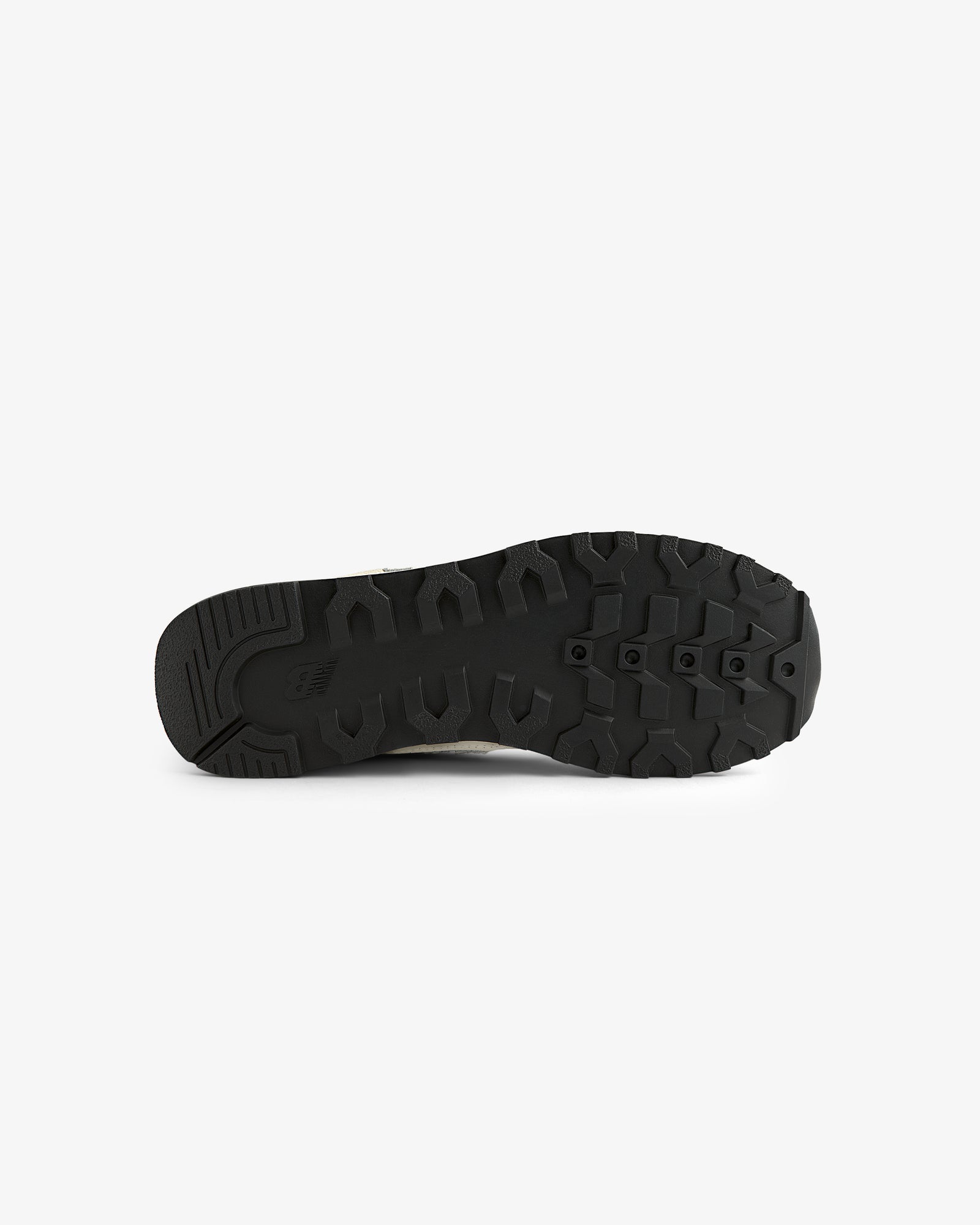 The ALD / New Balance 475 features a black rubber sole with rugged, textured tread, shown on a white background.