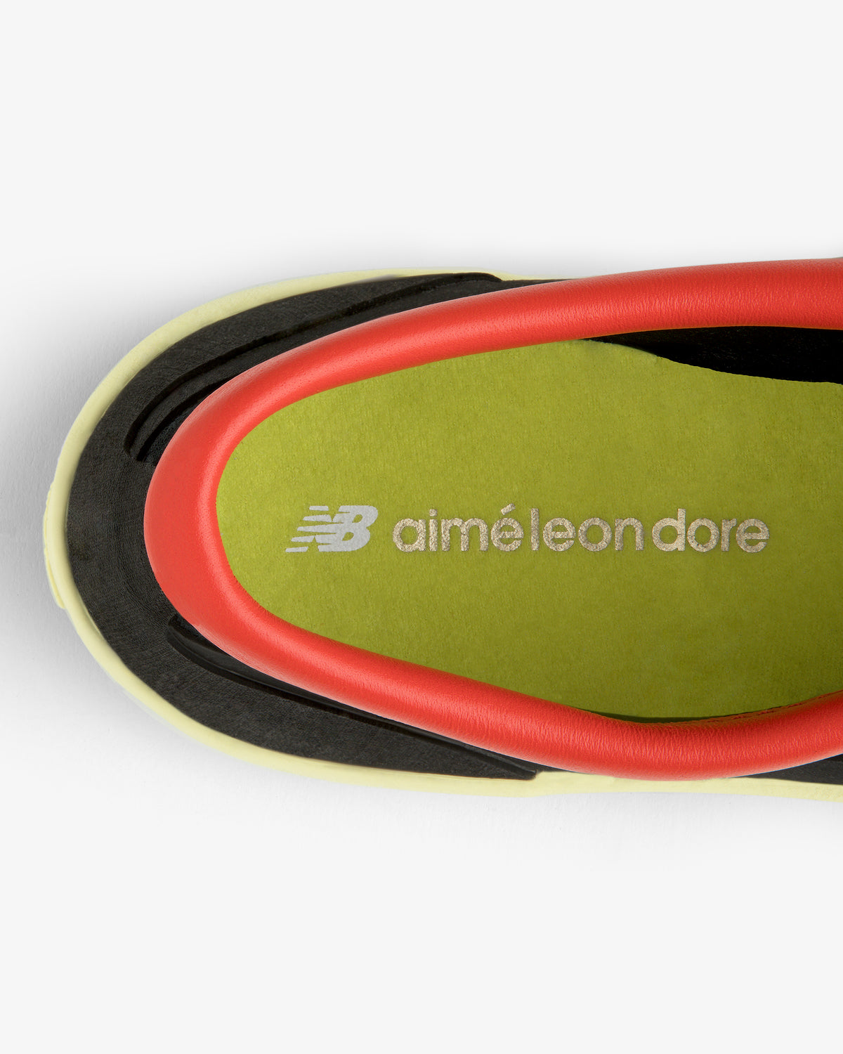 Top view of ALD / New Balance MT10T Sport Shoe with green insole featuring white NB Aimé Leon Dore branding.
