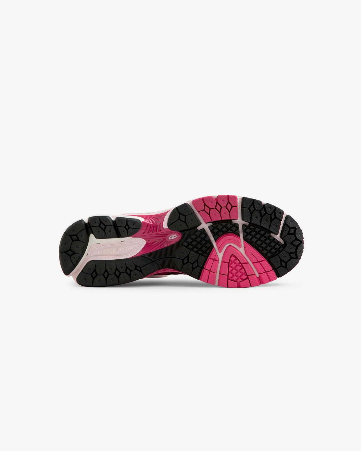 The image shows the black, pink, and gray sole of the ALD/New Balance 860v2 running shoe, viewed from below.