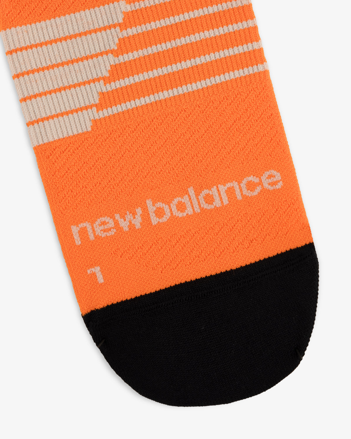 ALD / New Balance Running Crew Sock in orange with beige stripes, logo text, and black toe section.