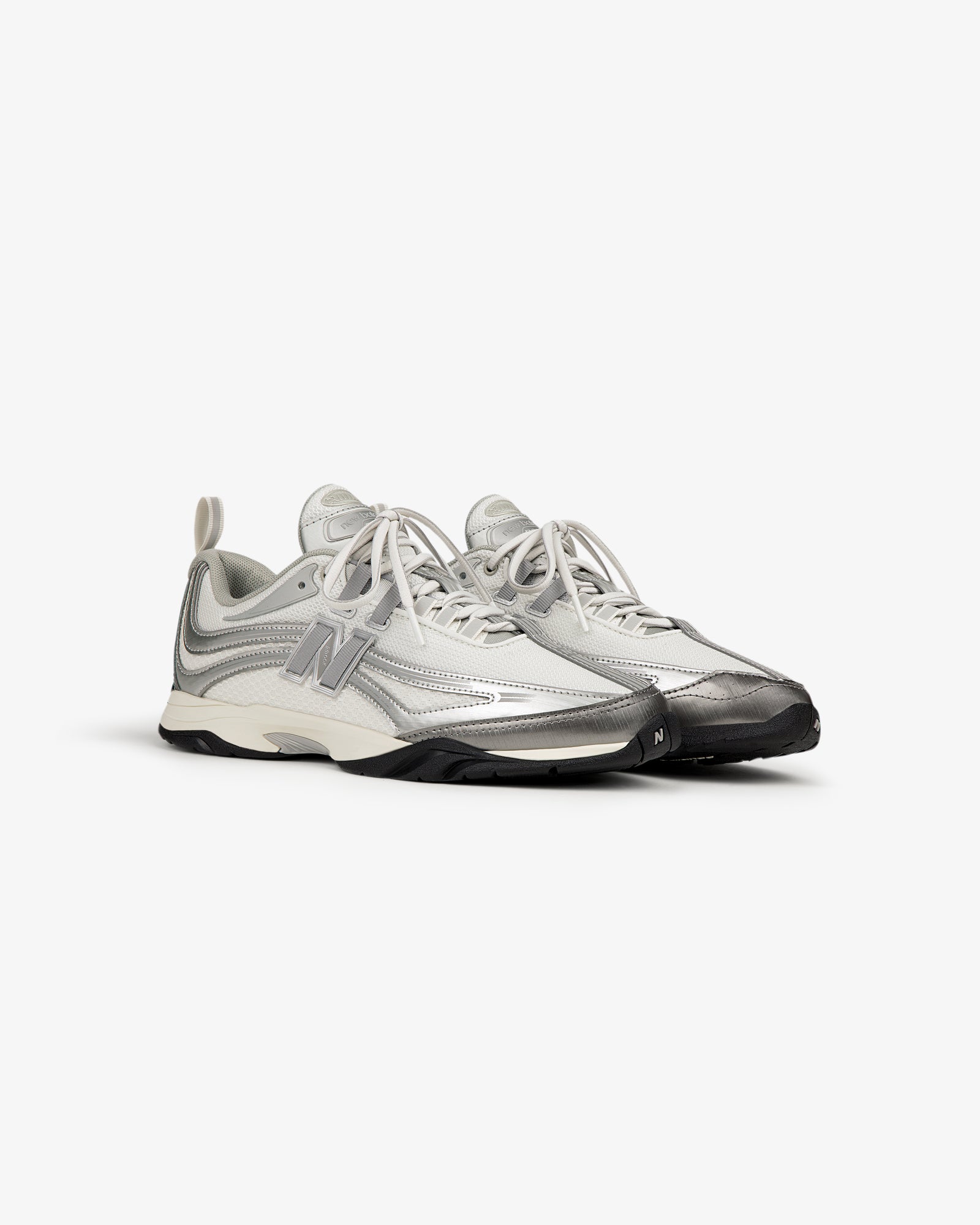 ALD / New Balance RC56 gray and white sneakers with black soles and a FuelCell midsole.