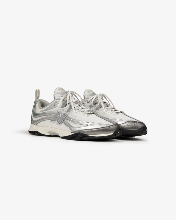 ALD / New Balance RC56 gray and white sneakers with black soles and a FuelCell midsole.