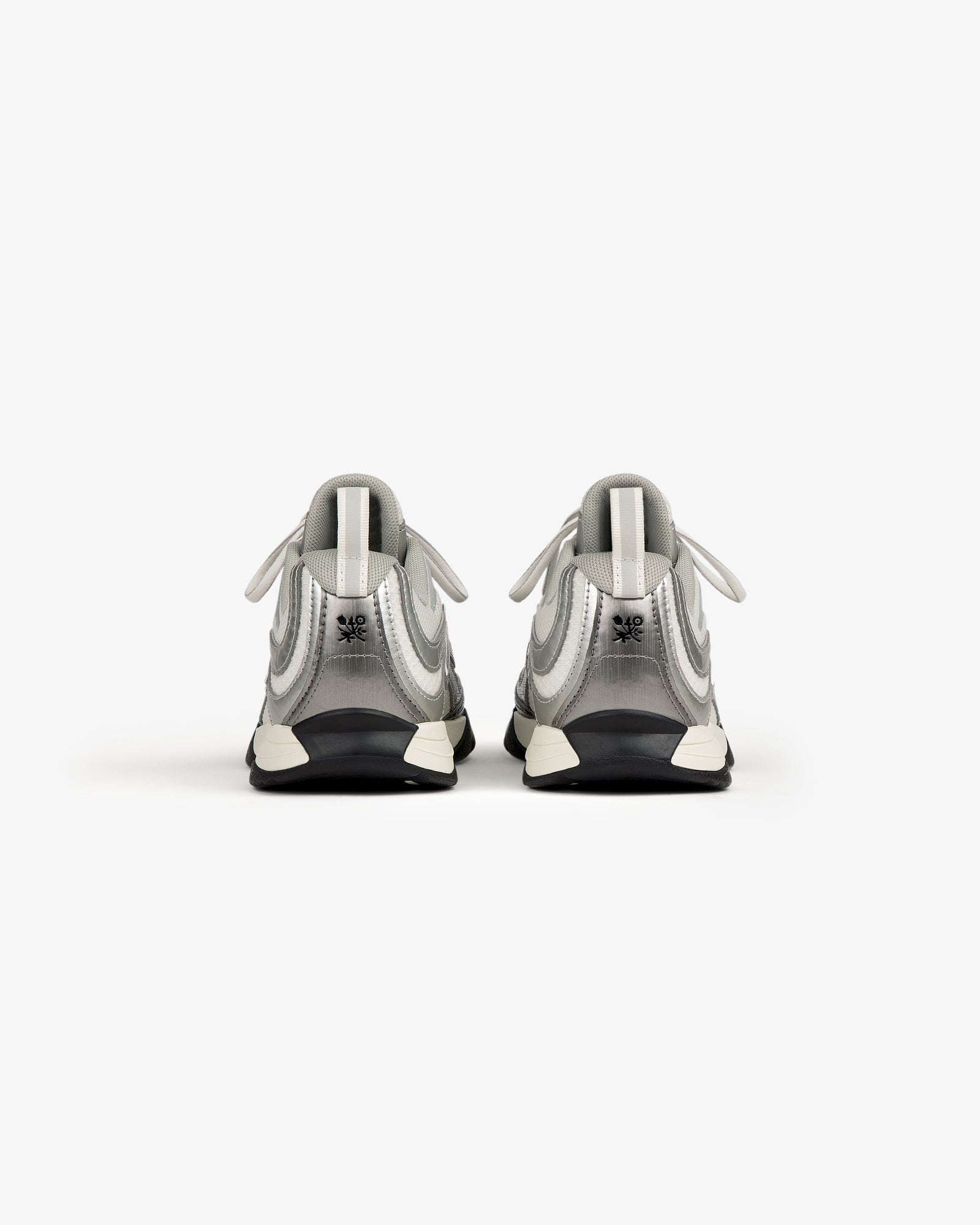 ALD / New Balance RC56 sneakers in gray and white with FuelCell midsole, shown from the back.