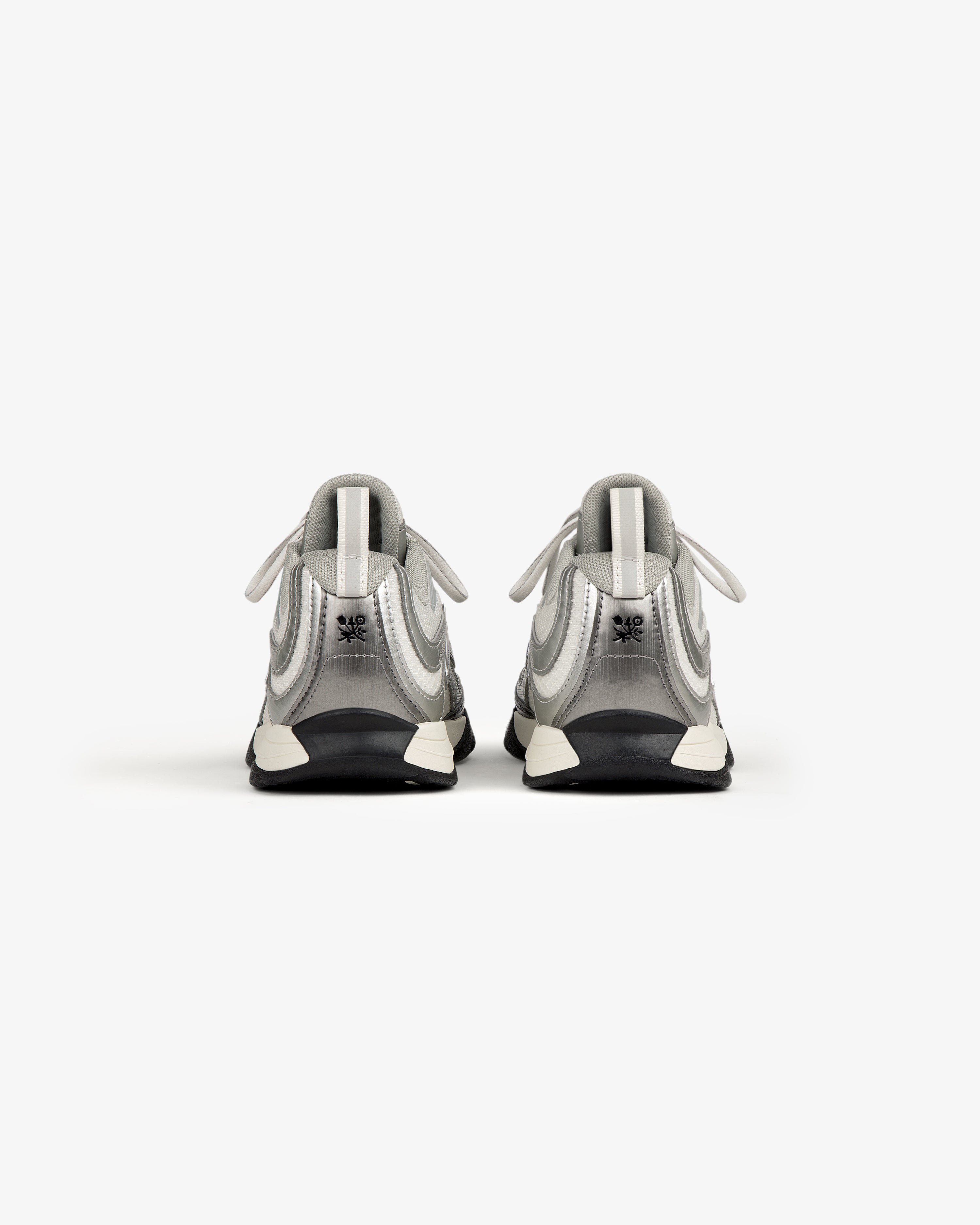 ALD / New Balance RC56 sneakers in gray and white with FuelCell midsole, shown from the back.