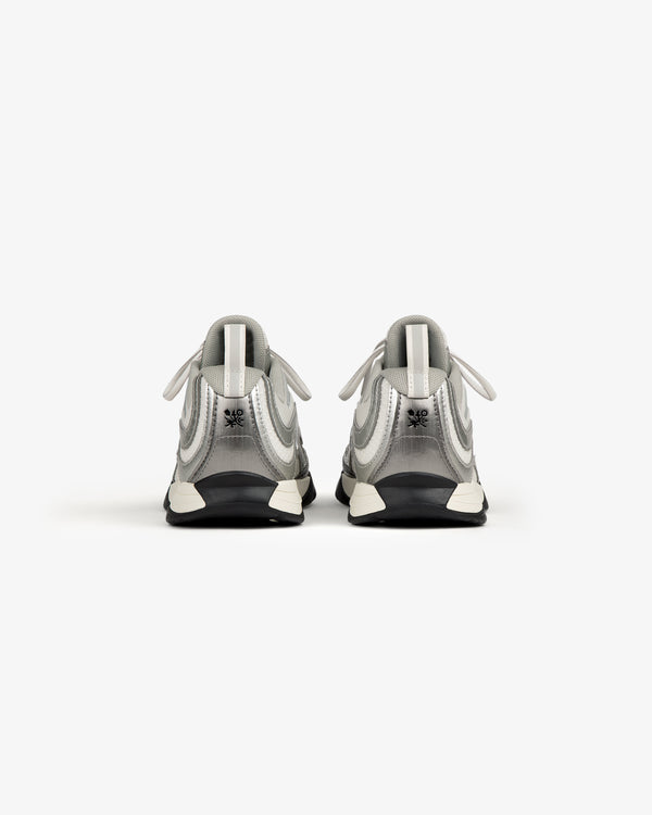 ALD / New Balance RC56 sneakers in gray and white with FuelCell midsole, shown from the back.
