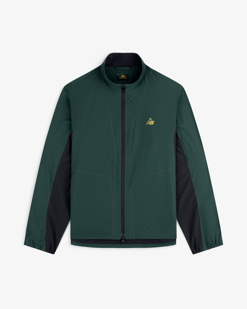 Dark green and black ALD / New Balance Performance Nylon Jacket with long sleeves and a gold chest logo.