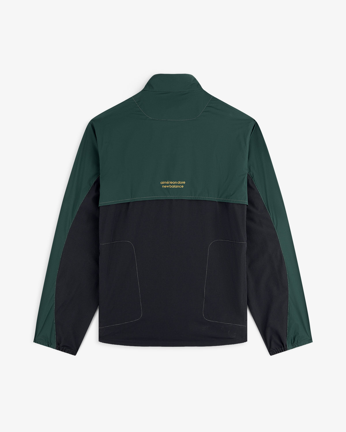 ALD / New Balance Performance Nylon Jacket with dark green sleeves/top, black bottom, and small yellow text on the back.