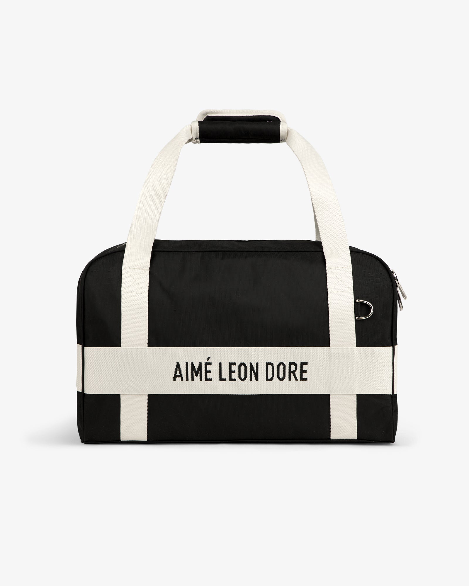 Nylon Duffle Bag with white handles and AIMÉ LEON DORE white strap, shown against a white background.