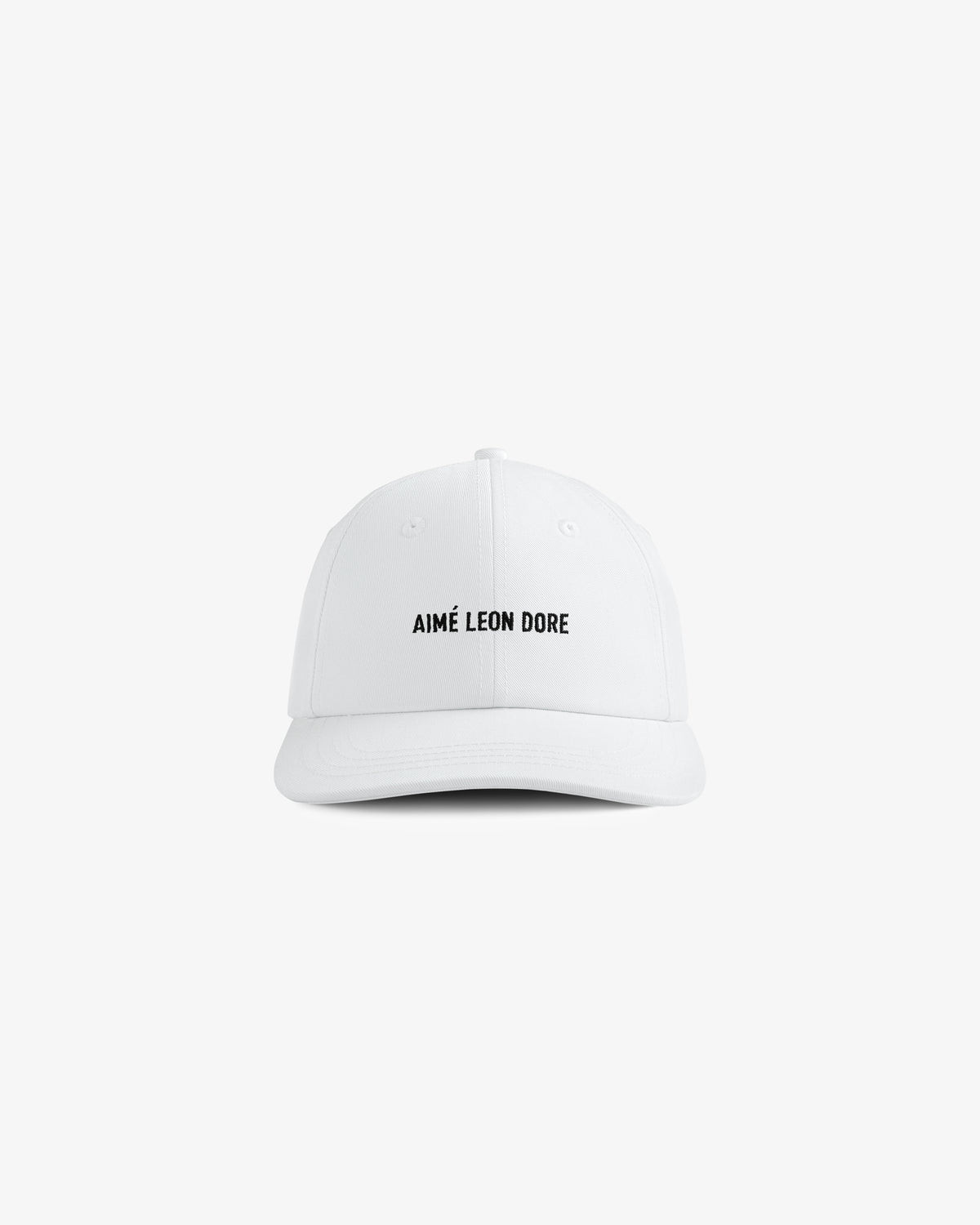 Core Logo Hat: white baseball cap with small black "AIMÉ LEON DORE" text centered on the front.