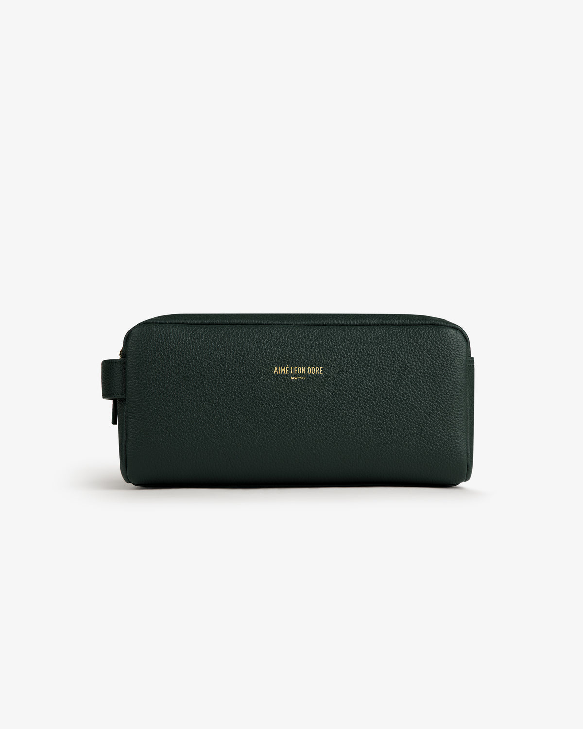 Dark green Leather Traveler Kit with gold AIME LEON DORE logo on front, shown against a white background.