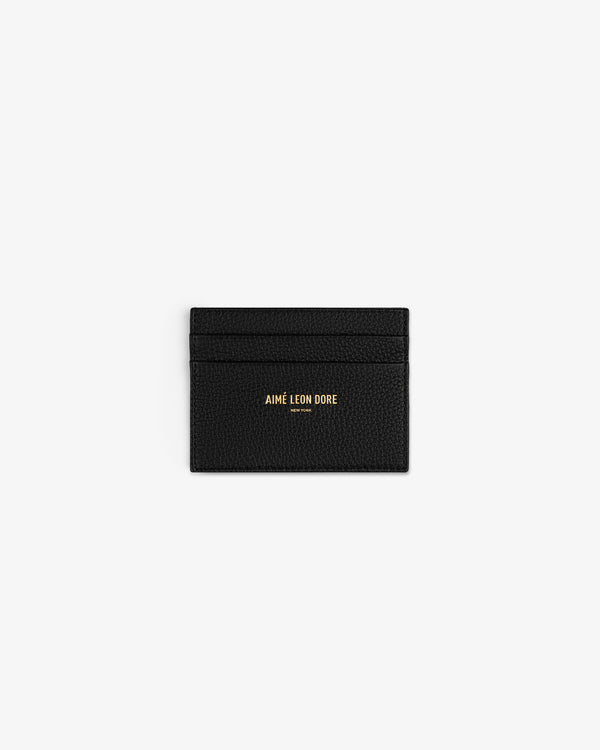 Leather Card Holder in black with two card slots and gold AIMÉ LEON DORE logo on the front.