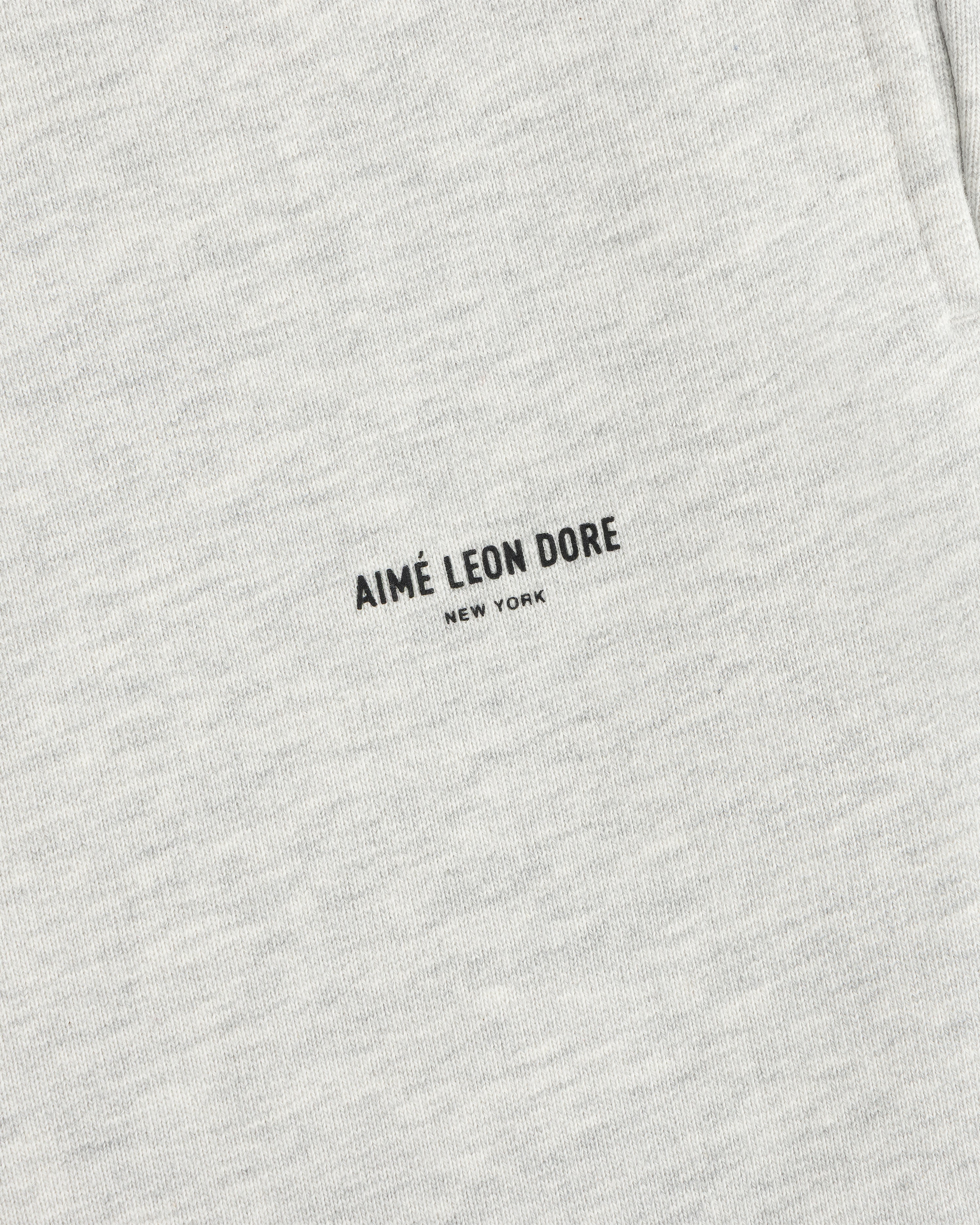 Light gray Micro Logo Sweatpants with small black AIMÉ LEON DORE NEW YORK text at the center.