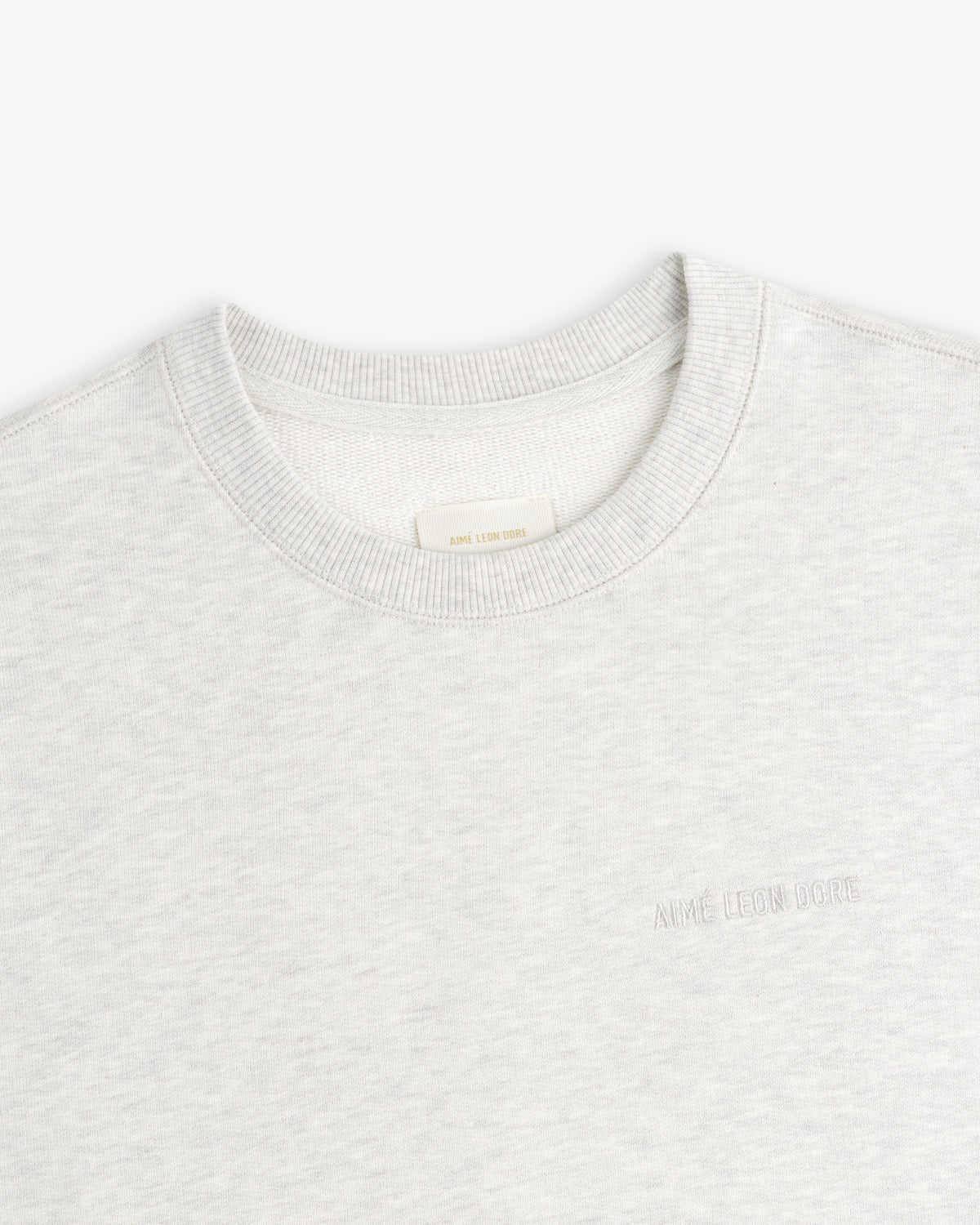 Light gray Tonal Logo Crewneck Sweatshirt with chest embroidery, shown flat on a white background.