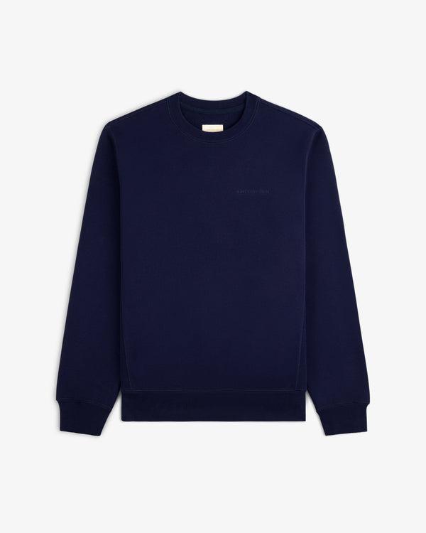 Tonal Logo Crewneck Sweatshirt in navy displayed on a white background.