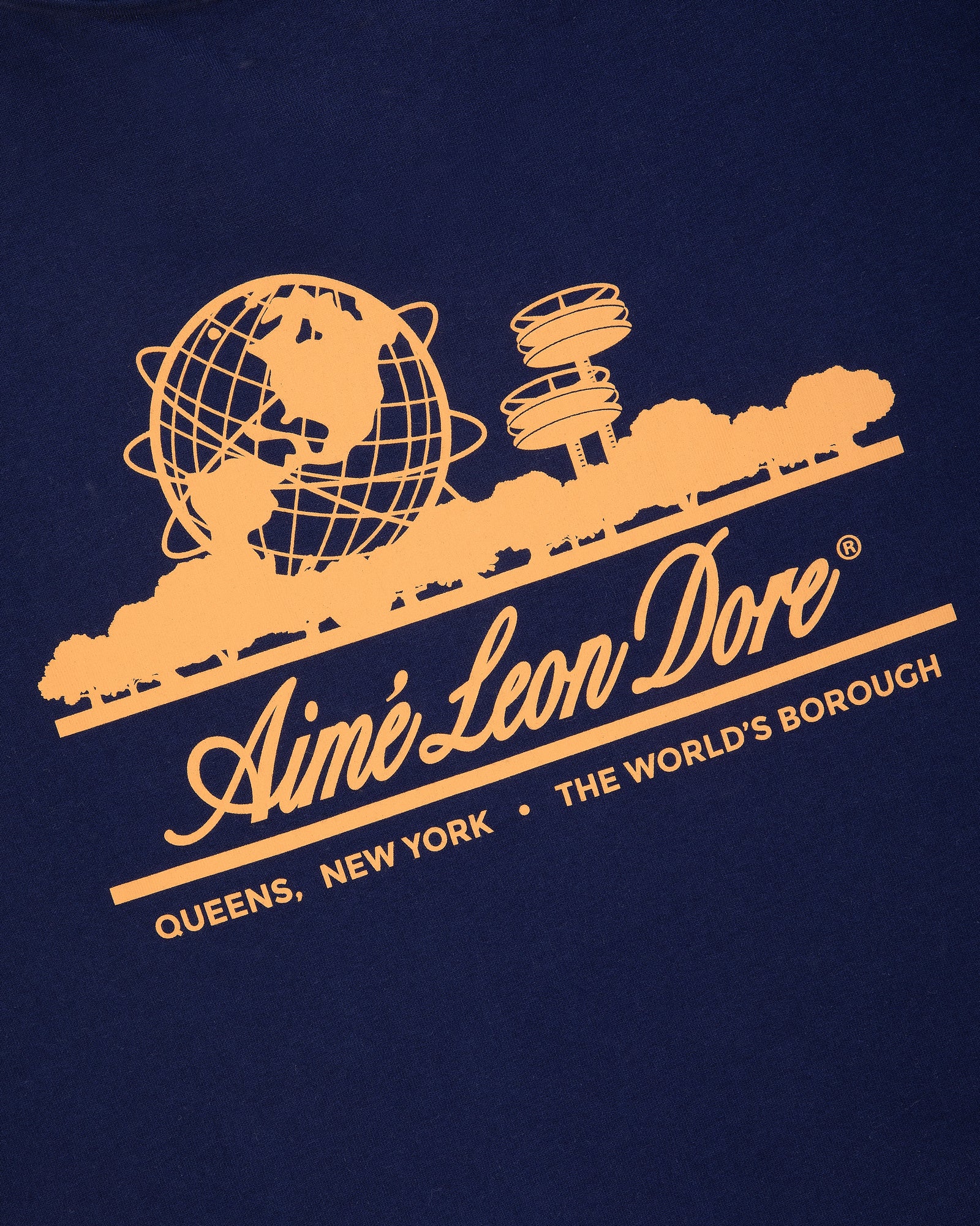 Navy Unisphere Tee with yellow Aimé Leon Dore logo, globe, trees, Queens landmarks, and text.