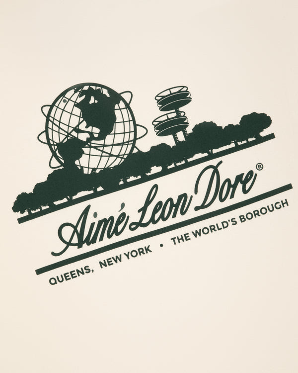 Green graphic Unisphere and NYC skyline tee by Aimé Leon Dore. Queens, New York—The World's Borough.