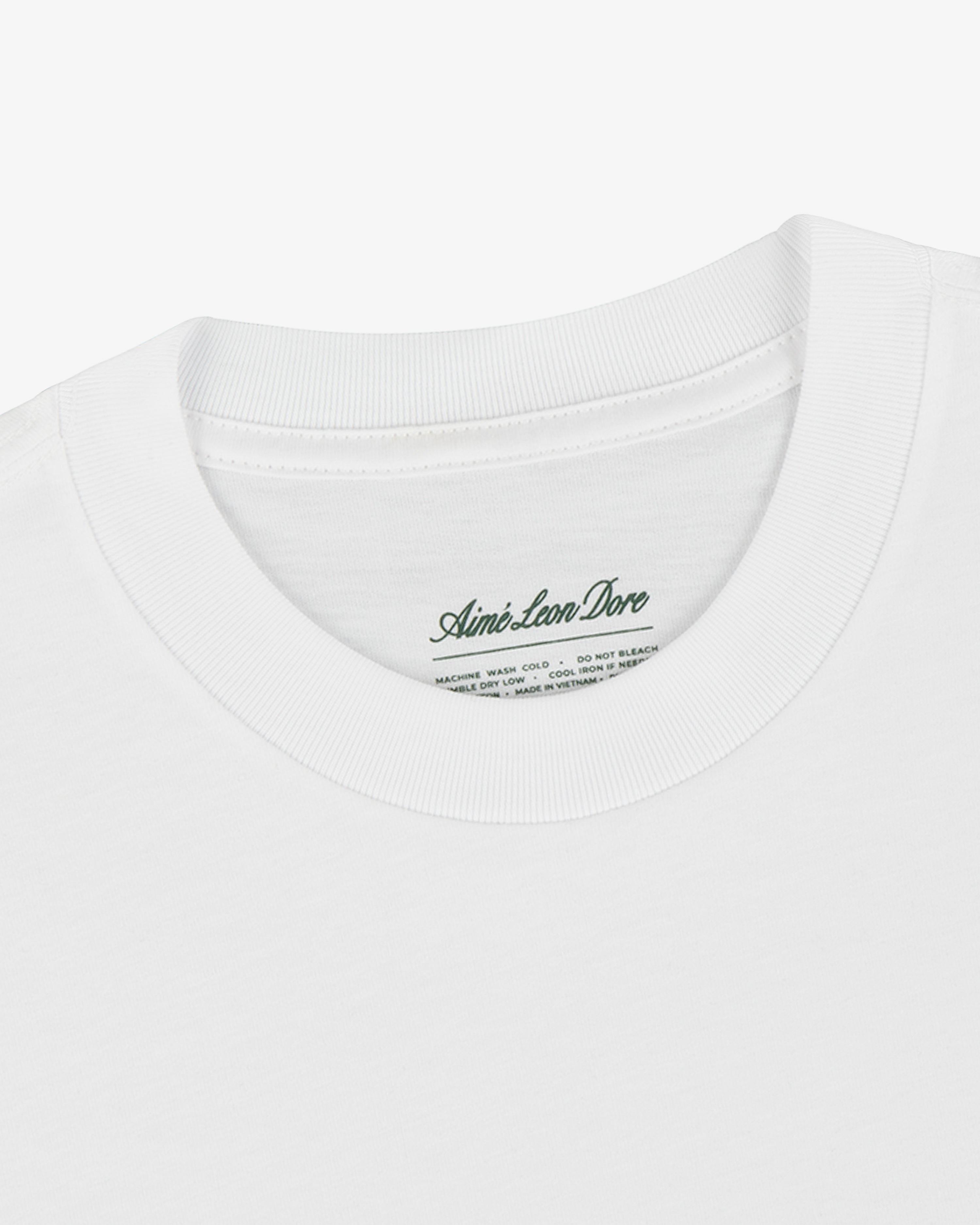 White crewneck t-shirt from the T-Shirt 3-Pack with a visible Aimé Leon Dore label inside the collar.