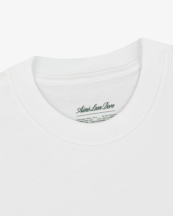 White crewneck t-shirt from the T-Shirt 3-Pack with a visible Aimé Leon Dore label inside the collar.