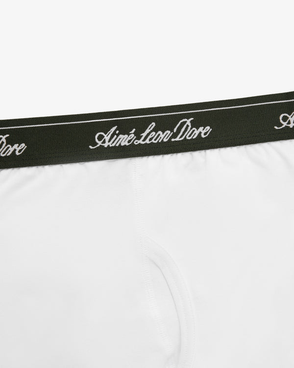 Close-up of Boxer Brief 3-Pack: white underwear with a dark green waistband and Aimé Leon Dore script in white.