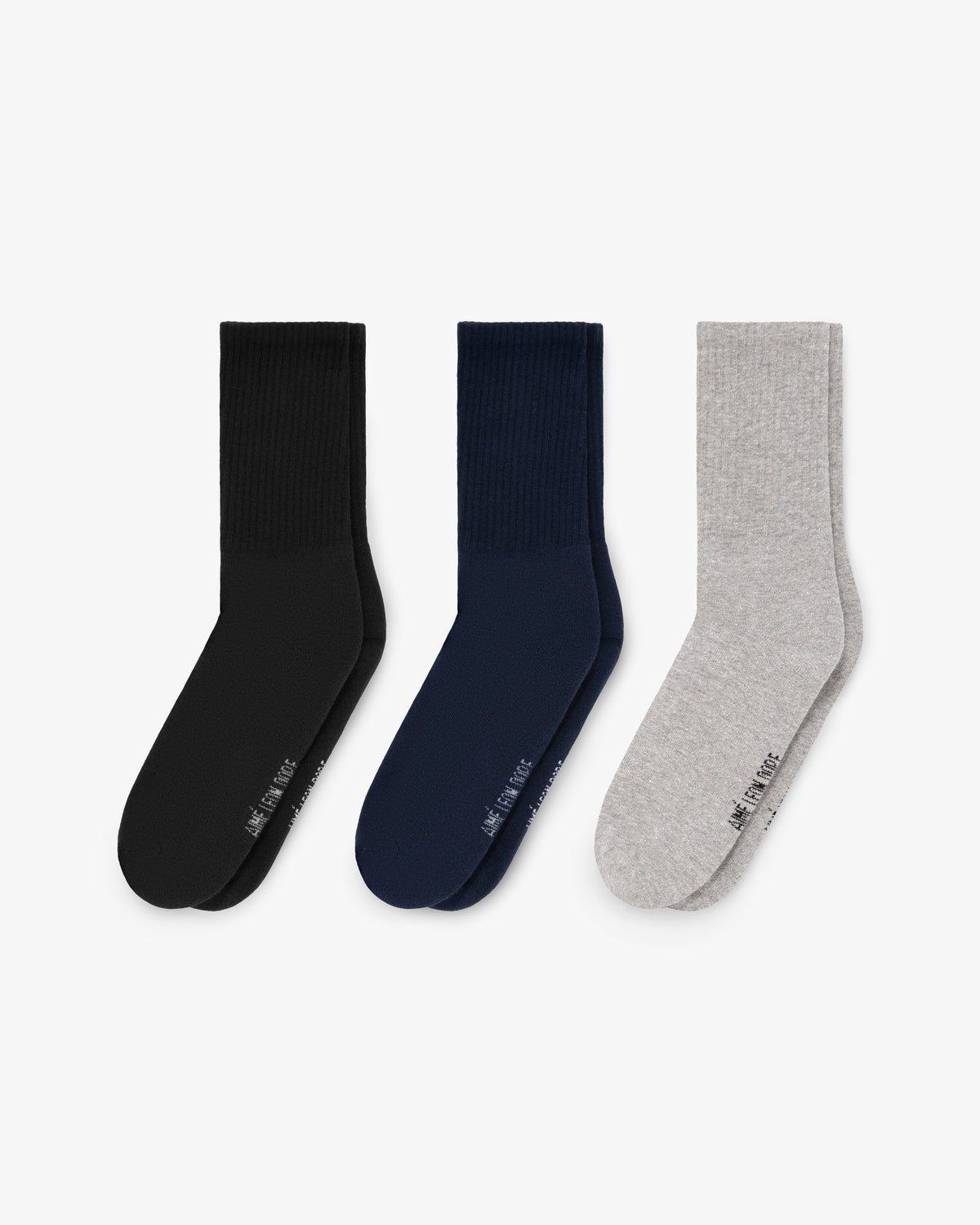Crew Sock 3-Pack: black, navy blue, and light gray pairs shown side by side on a white background.