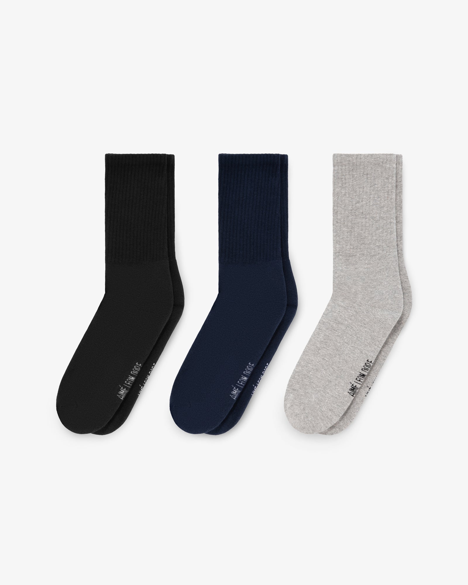 Crew Sock 3-Pack: black, navy blue, and light gray pairs shown side by side on a white background.