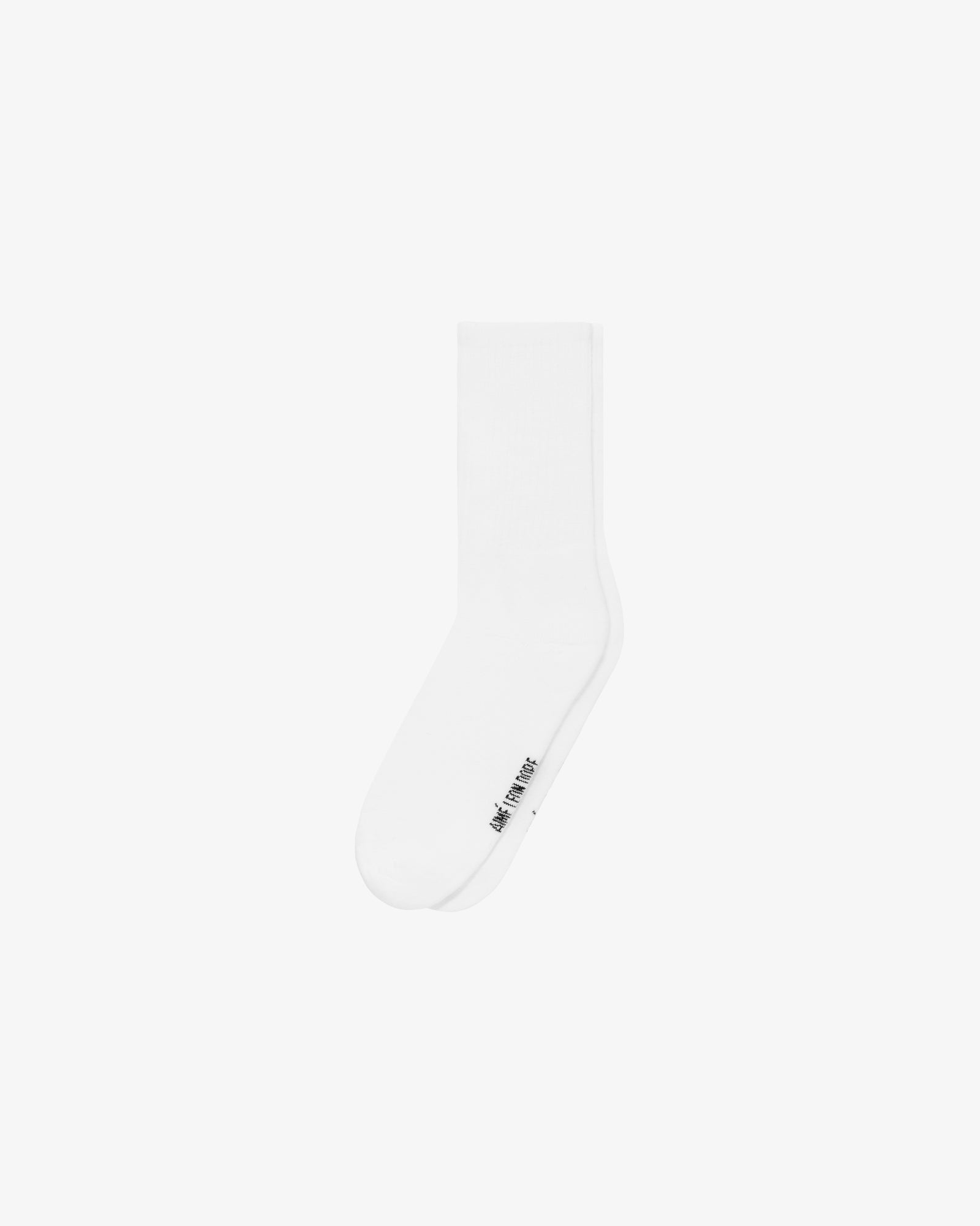 A Crew Sock 3-Pack in white with small black text near the toe, shown on a plain white background.
