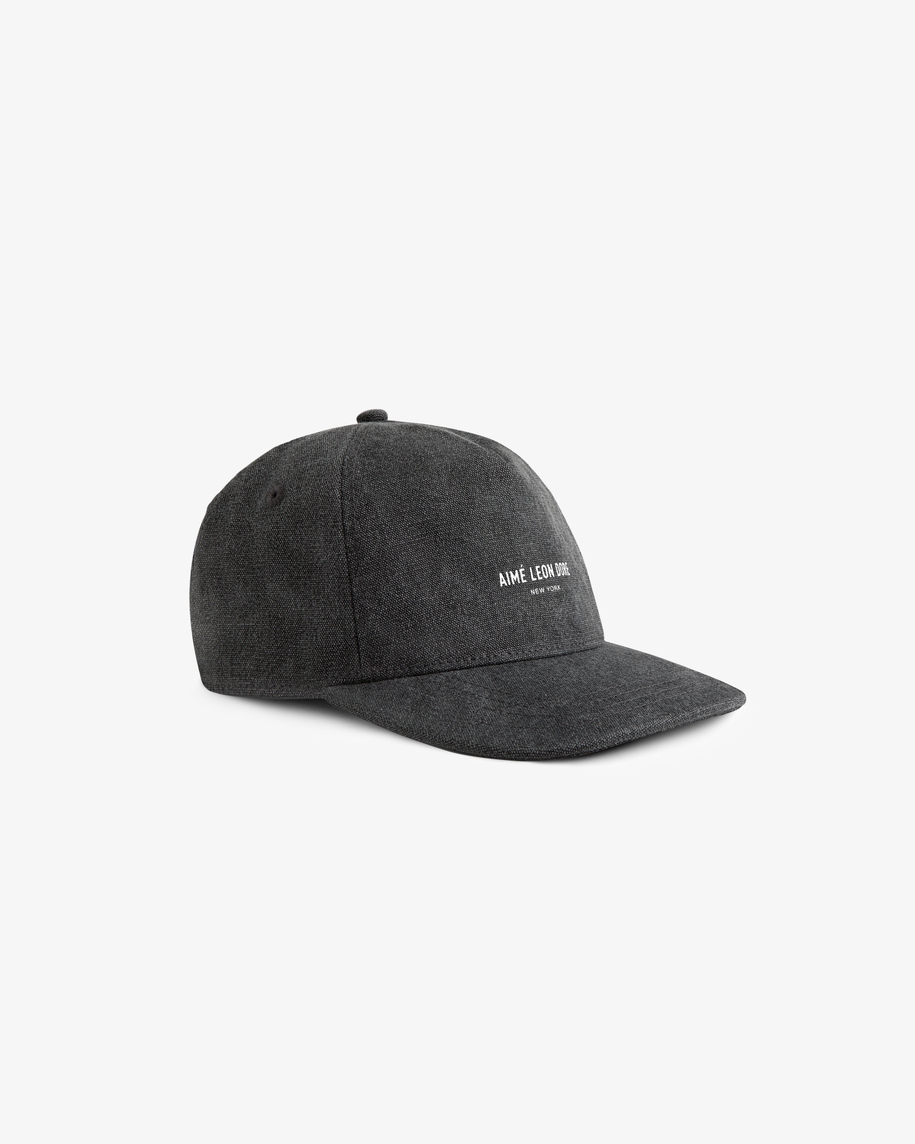Dark gray Micro Logo Hat with small white AIMÉ LEON DORE text embroidered on the front, shown on a plain background.