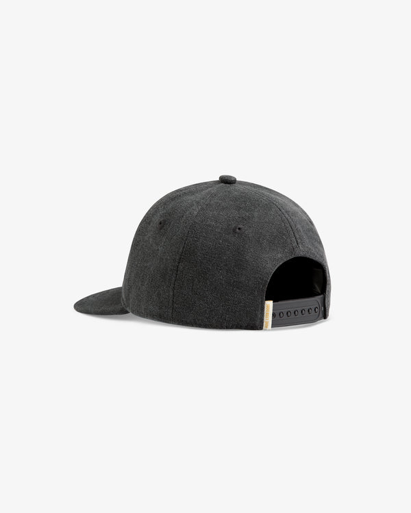 The Micro Logo Hat is a dark gray baseball cap with an adjustable snapback closure, shown from the back.