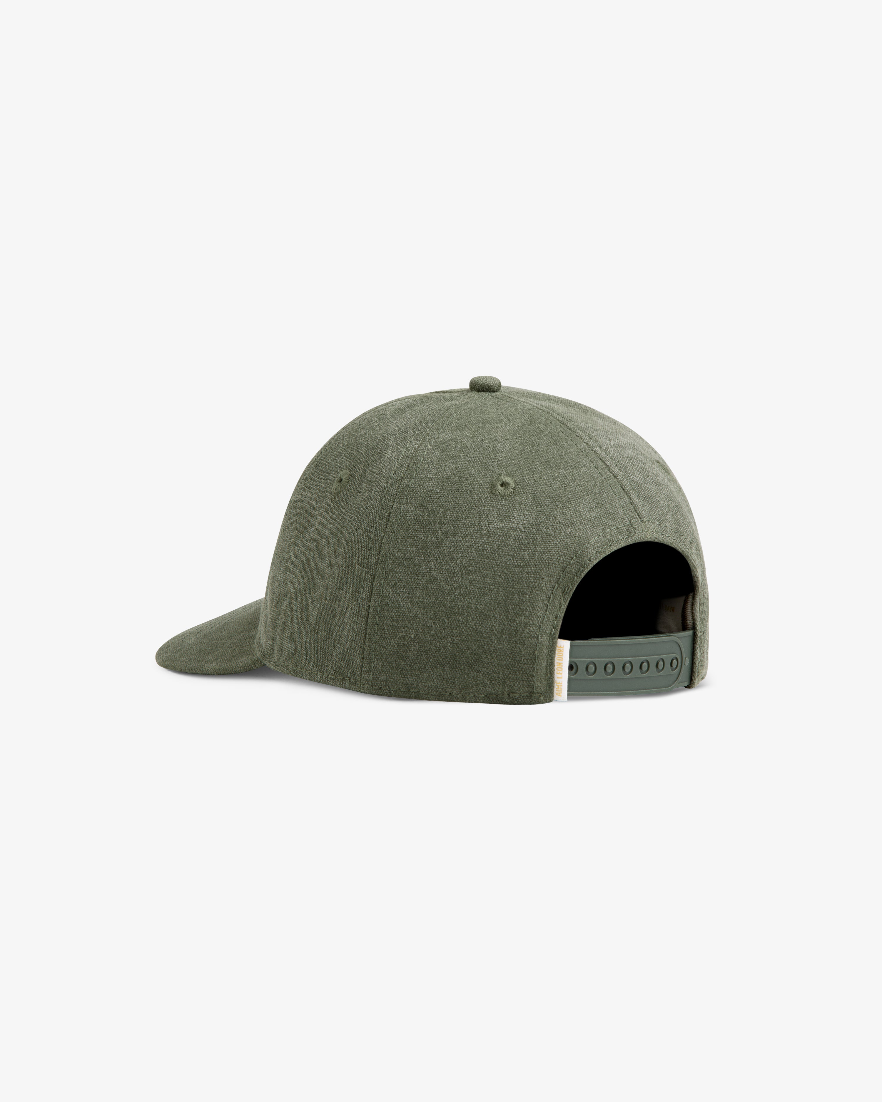 The Micro Logo Hat is a plain olive green baseball cap with an adjustable snap closure shown from the back.